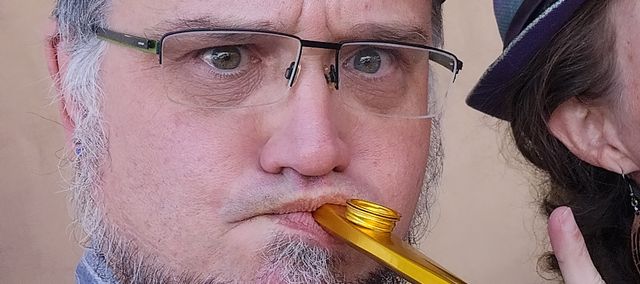 Groove blowing into a kazoo. As usual. 🙄️